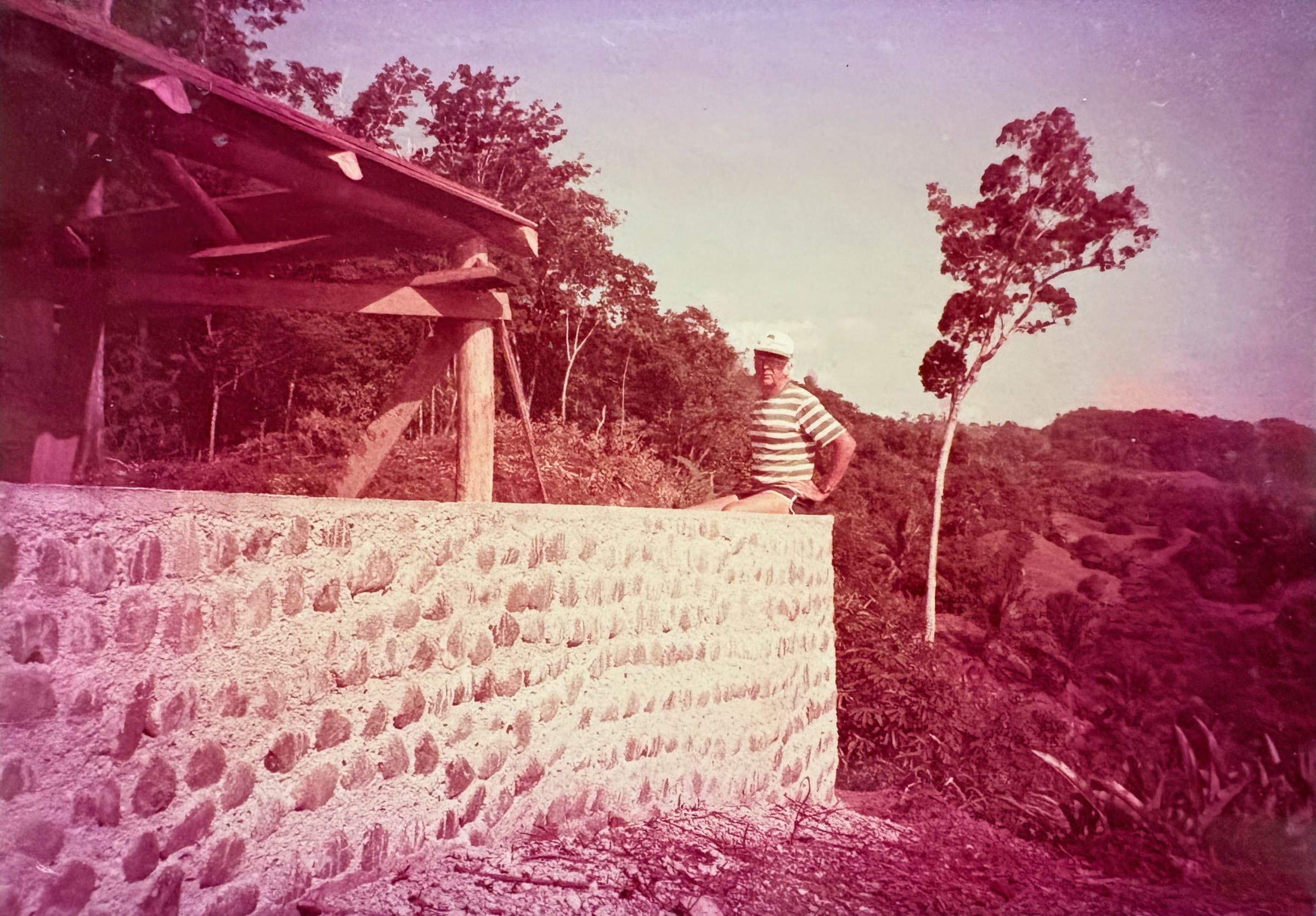 Fred Aspinall at the newly built Black Iguana cabin at Tiskita, with the largely cleared landscape behind him