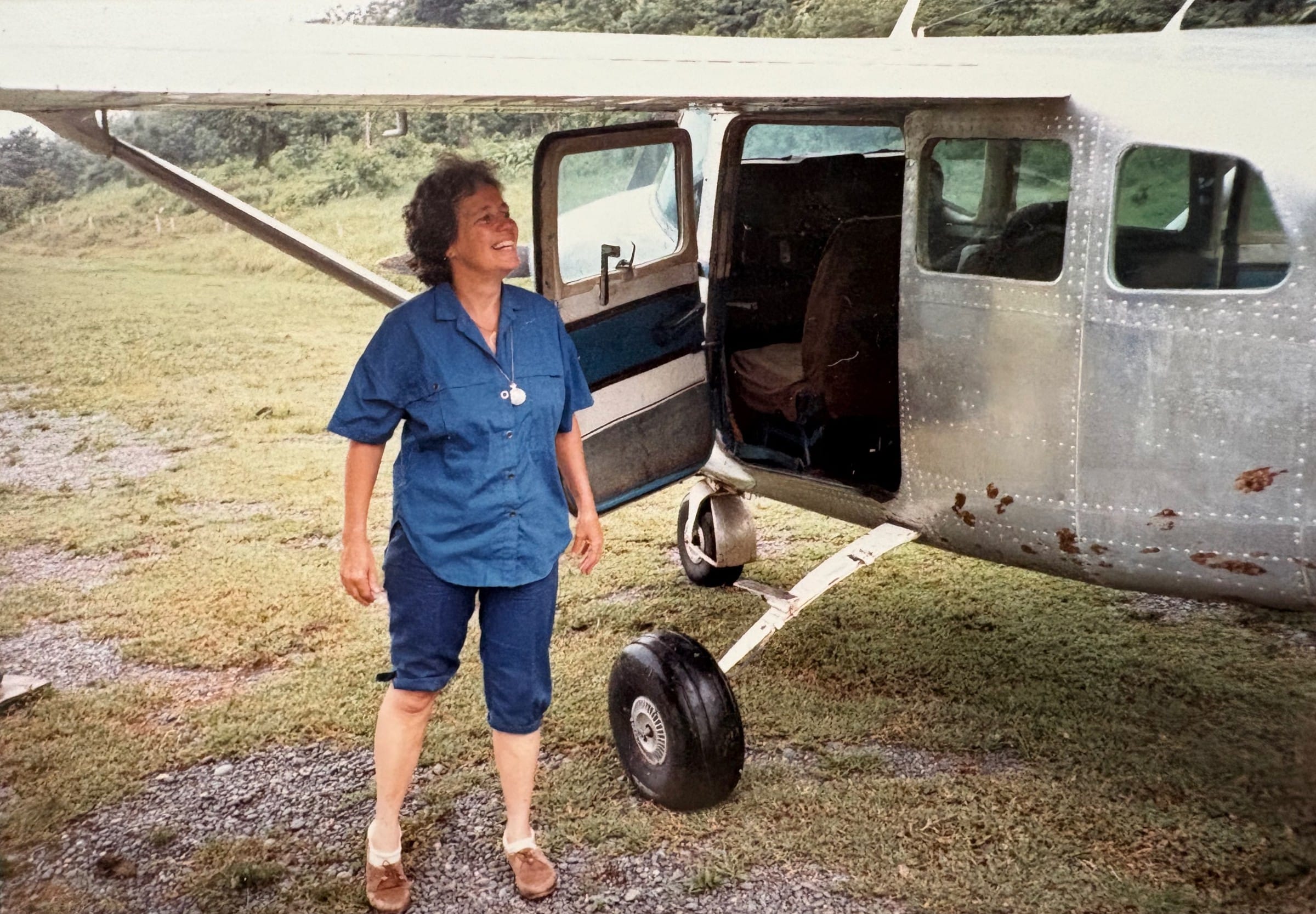 Zaira Murray Lindo standing beside her plane at Tiskita in southern Costa Rica